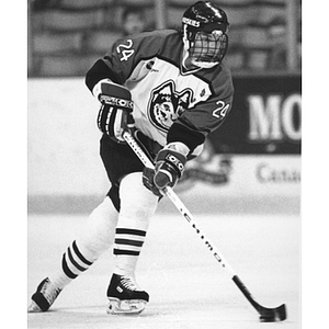 Men's hockey player skates during the Beanpot tournament