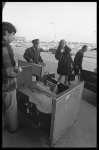 Judy Collins arriving at the airport with luggage in tow and redcap and limousine driver assisting