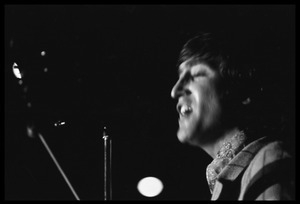 John Lennon performing with the Beatles at D.C. Stadium