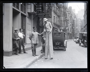 High stilt walker issued a citation by the police