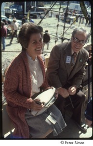 MUSE concert and rally: unidentified woman and man by No Nukes rally stage