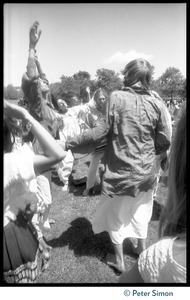Bhagavan Das and dancing women during Ram Dass's appearance at Sonoma State University