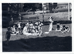 Children eating in the grass in Boston Common