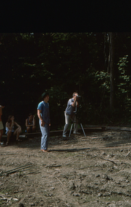 Hank Flynt filming the Moon Barn Raising at entrance to Hopkins Forest on 2 August 1975.