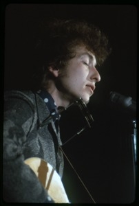 Bob Dylan performing on stage