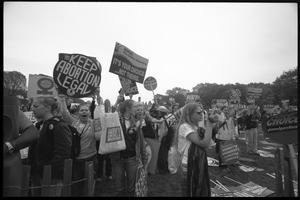 Crowd of marchers holding up pro-choice signs 'Keep abortion legal' and 'It's your choice... not theirs': 2004 March for Women's Lives