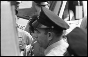 Abbie Hoffman getting arrested for wearing an American flag shirt