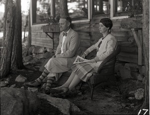 Dorothy and L.D. Roys seated on the porch at Camp Idlewild