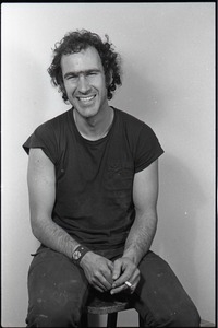 Studio portrait of Richard Safft, seated on a stool