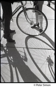 Bicycle and shadows on a sidewalk, Boston University