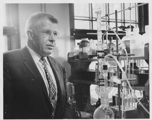 William B. Esselen standing in laboratory