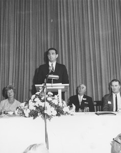 Unidentified man at podium