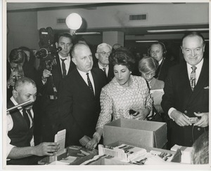 Bob Hope and Licia Albanese observing clients working