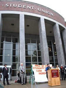 Congressman John W. Olver in front of the UMass Amherst Student Union Building, waiting to speak to rally against student loan debt