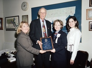 Congressman John W. Olver receiving a legislative award from the National Association of Pediatric Nurse Practitioners
