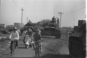 U.S. tanks, 25th Division take position to defend Tan Son Nhut Air Base; Saigon.