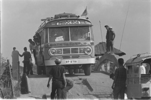 Vietnam buses on the road to Tay Ninh.