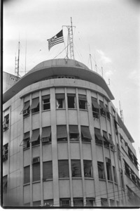 Bombing of U.S. Embassy in Saigon. Embassy flag has hole in middle.