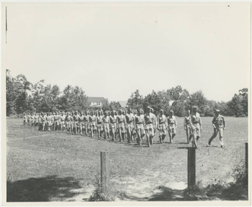 Army Air Corps marching off a field (May 1943)