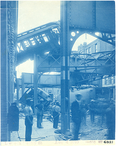 Wreck at Dudley Street, view below tracks wreckage of train cars