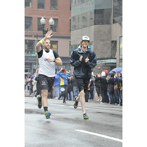 Two male runners participate in "One Run" on Boylston Street