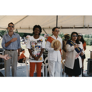 Four people on stage at the Festival Puertorriqueño