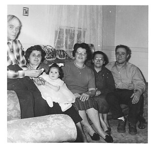 Leite family posing on couch