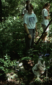 Permanent Plot 0630 with dump containing bras and other articles of clothing. Left to right: Susan Halbach, Tim Billo (both Class of 1997) and Benjamin Montgomery (Class of 1998).