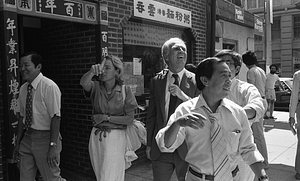 Mayor Kevin White and Kathryn White walk with Davis Woo, Frank Chin and Billy Chin through Chinatown during the 1979 August Moon Festival