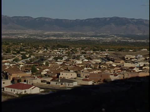 Volcanos, Cliffs, Rooftops, Pan of Interstate from RT66, East Side, House with City Background, Westside, Sandias Foothills.