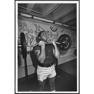 Man lifting barbell