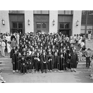 The Law School class of 1980 poses on the steps of Ell Hall