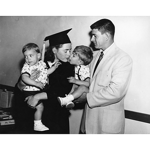 Anne H. MacDonald with her family before the June 16, 1957 commencement ceremony