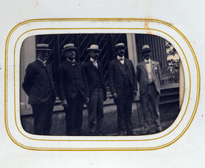 Full-length group portrait of the five Bowen brothers, facing front, location unknown