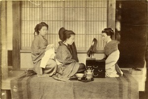 Japanese women fixing hair