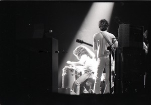 Santana concert at the Springfield Civic Center: Carlos Santana (back to camera) playing to the band