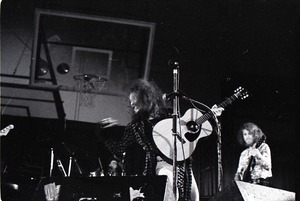 Jethro Tull in concert at the Springfield Civic Center: Ian Anderson playing acoustic guitar, Martin Barre in background