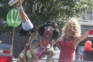 Parade marchers in wild costumes, with a cocktail shaker : Provincetown Carnival parade