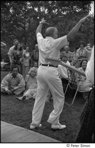 My Wedding: Peter Dean, uncle of Peter Simon, seen from behind as he performs for the wedding party