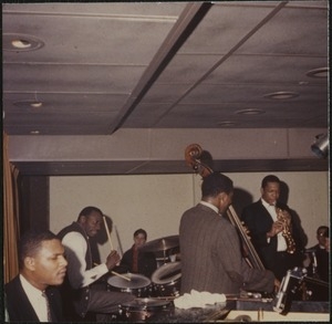 John Coltrane (saxophone), Jimmy Garrison (double bass), Elvin Jones (drums), and McCoy Tyner (piano) performing at the Jazz Workshop