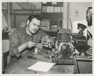 A TOWER automobile mechanic at work