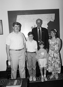 Congressman John W. Olver (right) with a group of visitors to his congressional office