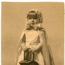 Young girl holding a basket