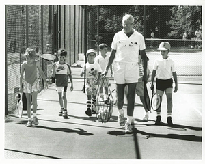 Vernon Cox on the Tennis Courts with Kids