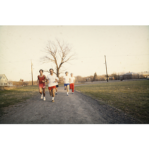 Men jogging on an outdoor track