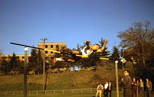 Tom Flubacher jumps 6' 5" (1958)