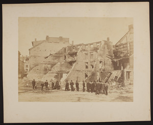 Group of men in front of a building ruin, 1872