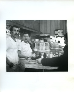 Workers at café counter, New York City