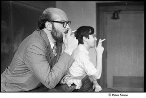 United States Student Press Association Congress: unidentified man smoking with Raymond Mungo (r)