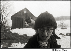 Raymond Mungo with calico cat on his shoulder, Packer Corners commune